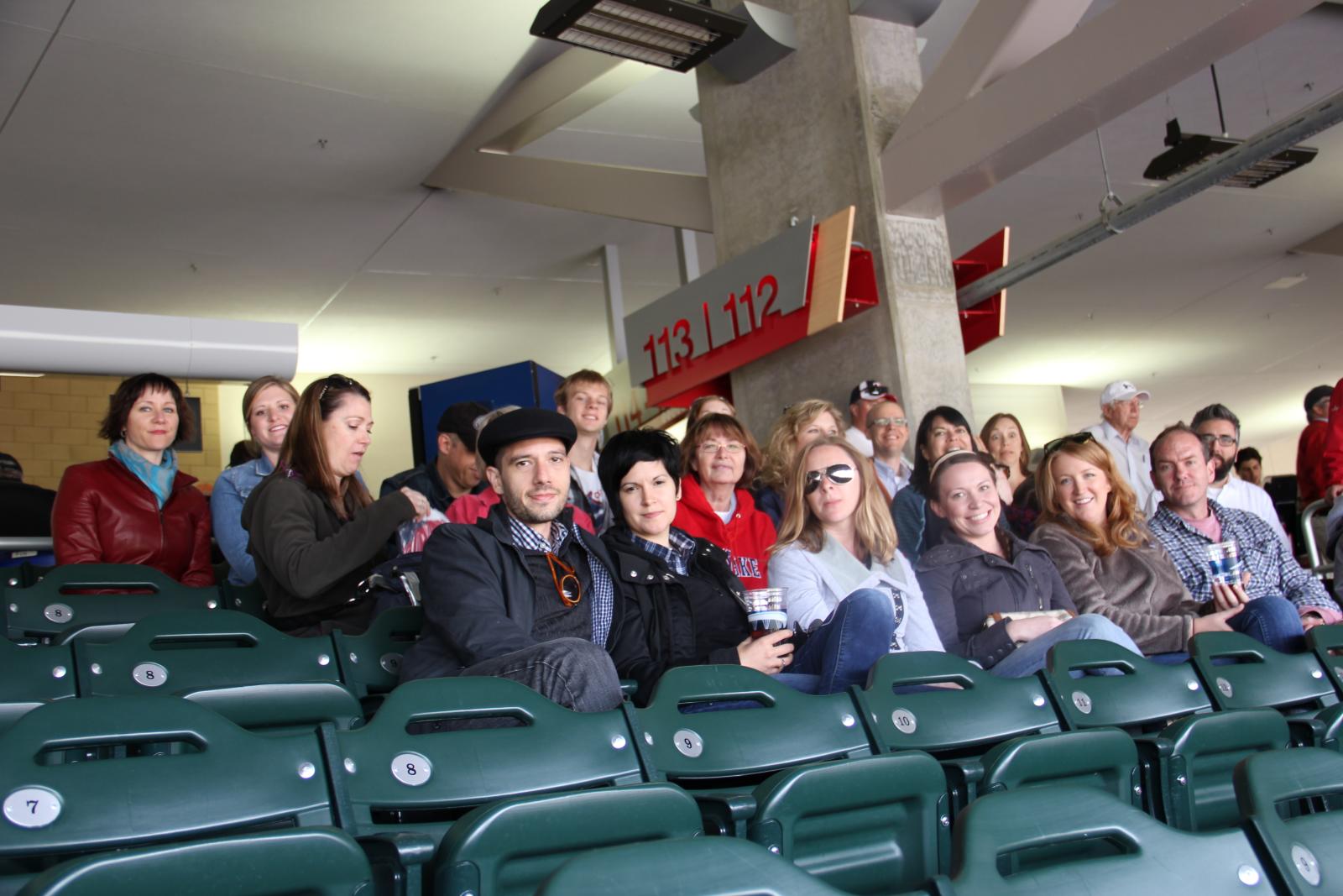 a group of people in a stadium waiting