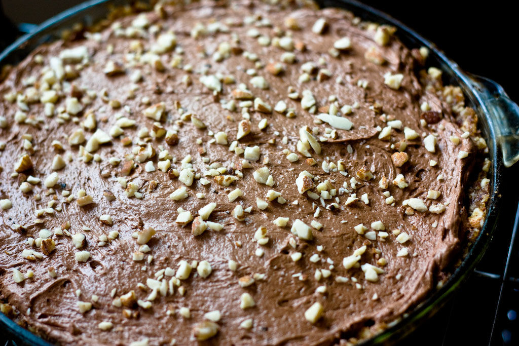 a cake with nuts is shown in the middle