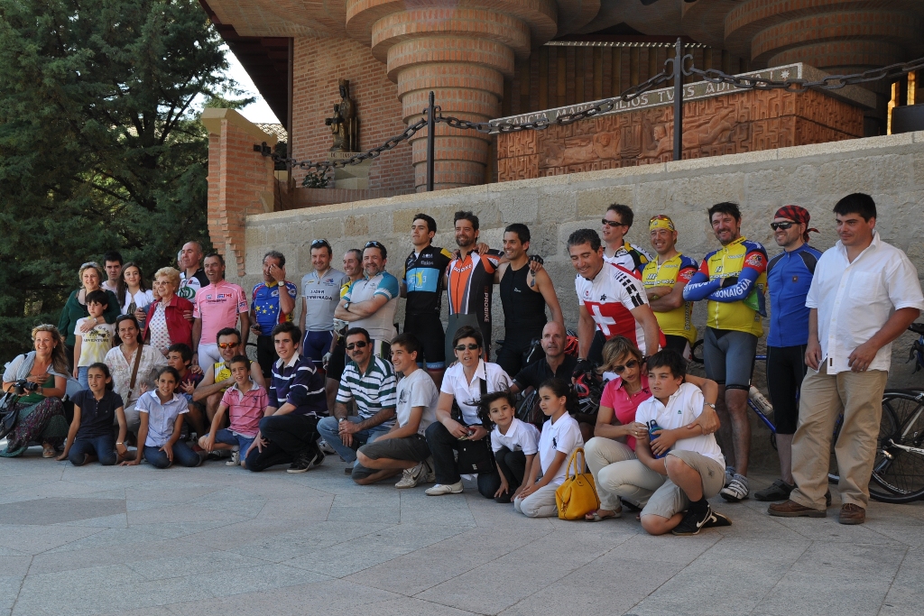 a group of people are posing for a picture