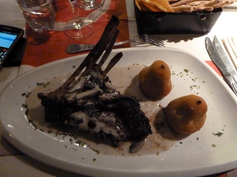 a plate with dessert and a cell phone next to it