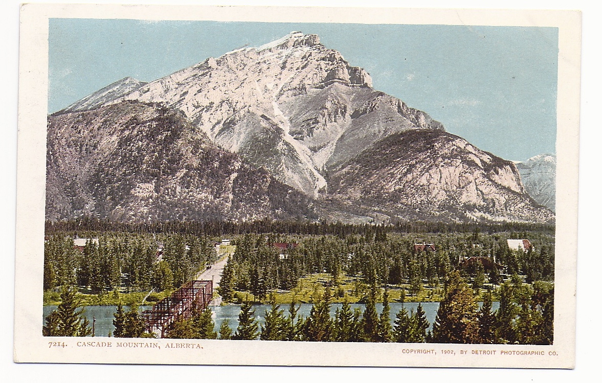 a postcard with a mountain and the word yellowstone written on it