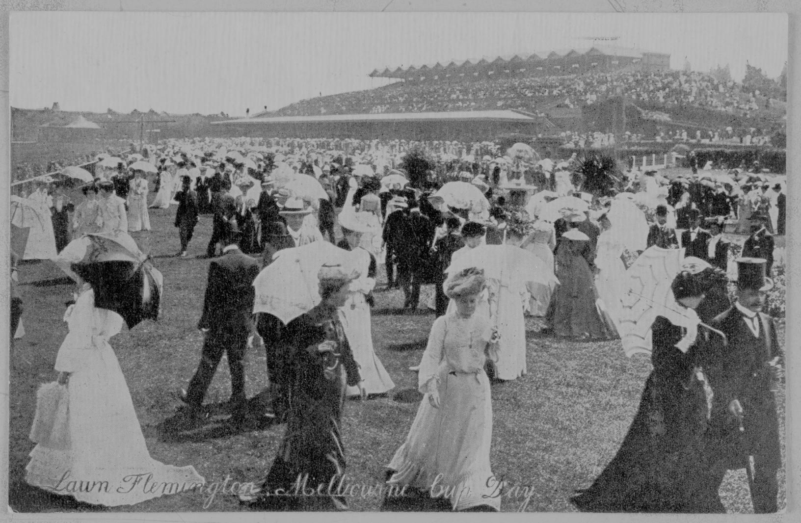 a large group of people outside in a park