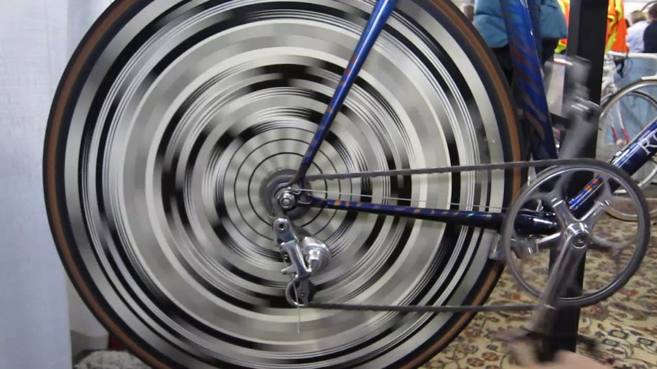 an indoor bike wheel on display at a bicycle show