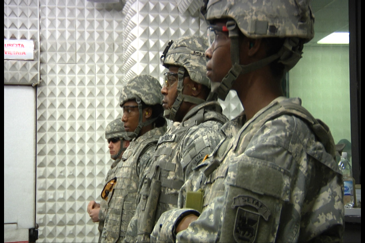 a group of people in uniform looking at each other