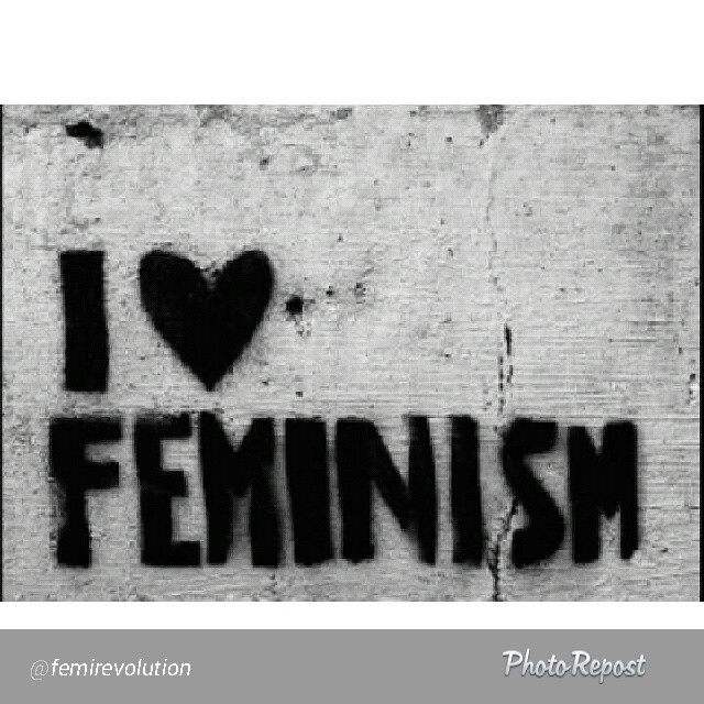 graffiti in black and white with the words i love feminist