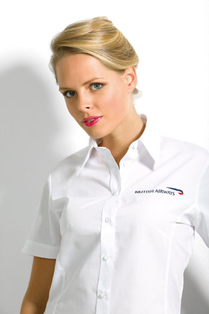 a beautiful blonde woman wearing a white shirt