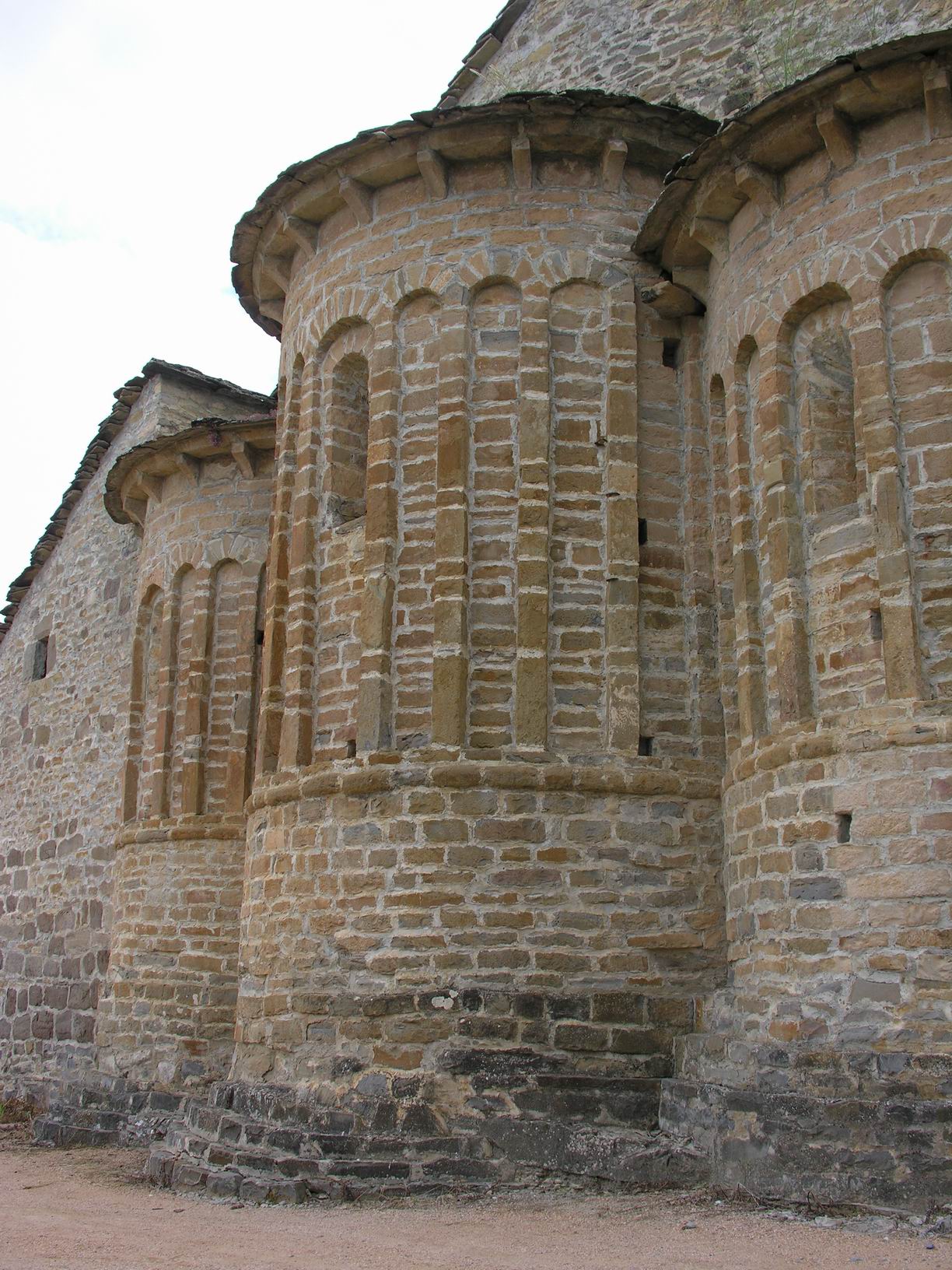 a large stone building with several windows on it