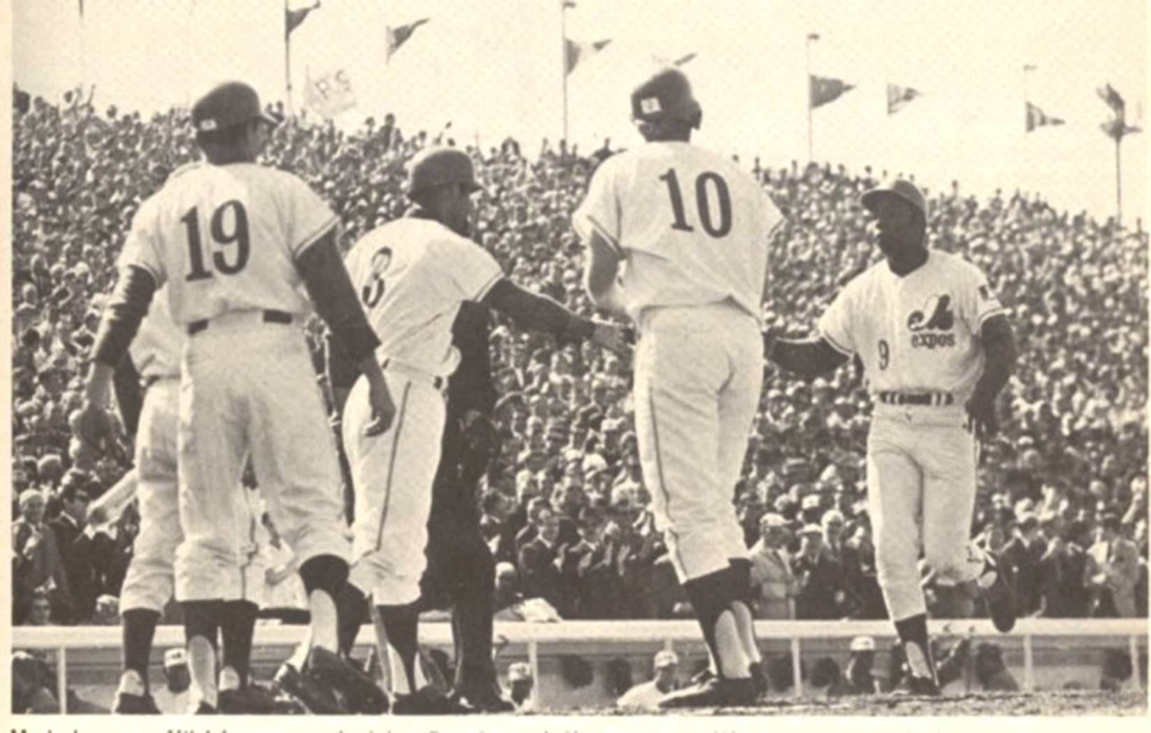 vintage po of baseball players standing on a field