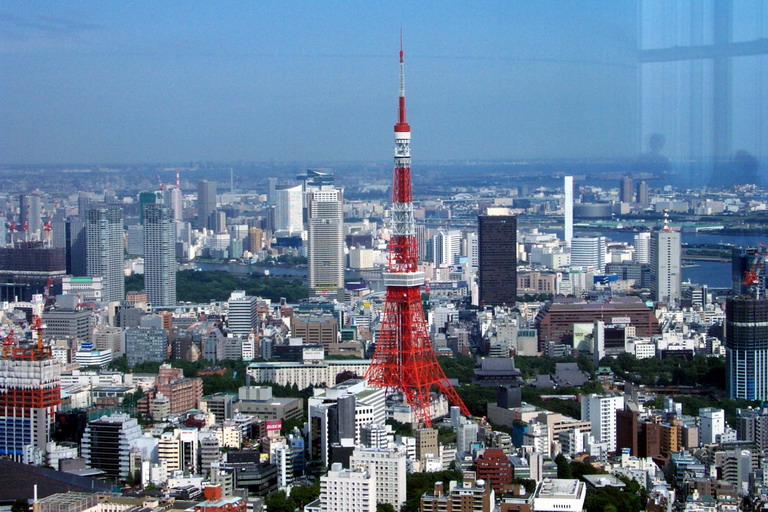 the tokyo skyline with the tokyo eye building in the foreground