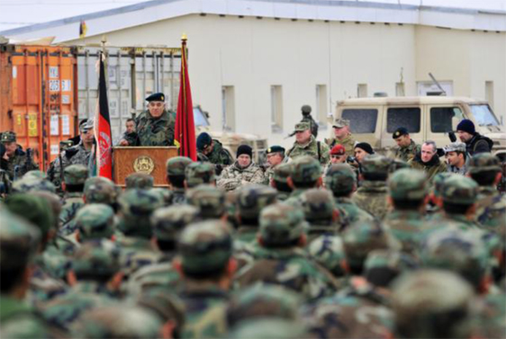 soldiers stand in front of a group of people