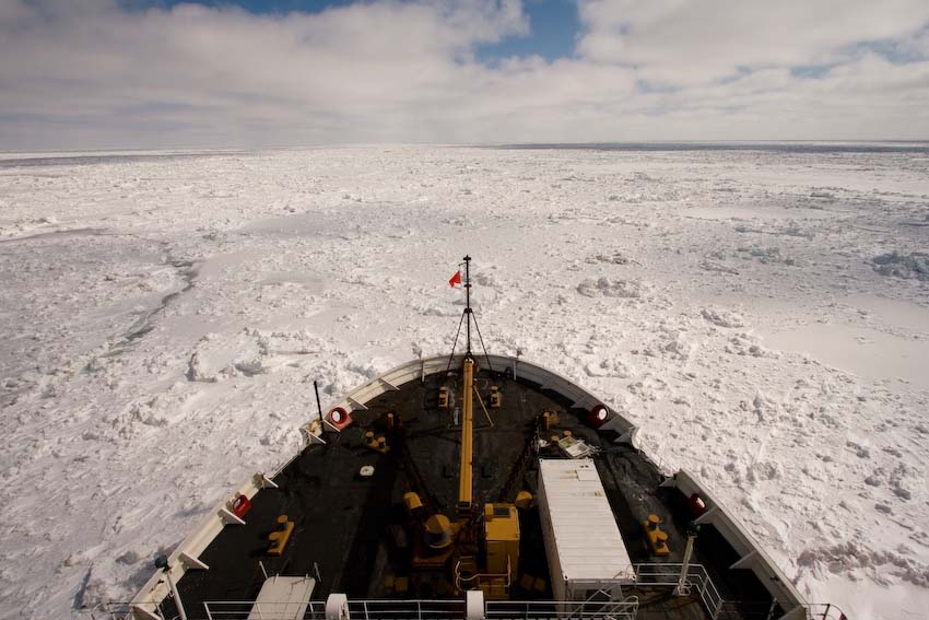 a ship is driving through the snow