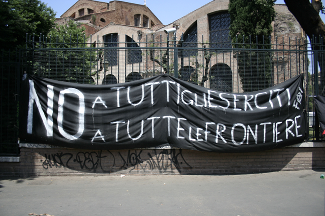 a banner with the message no to futuratoriia is attached to a fence