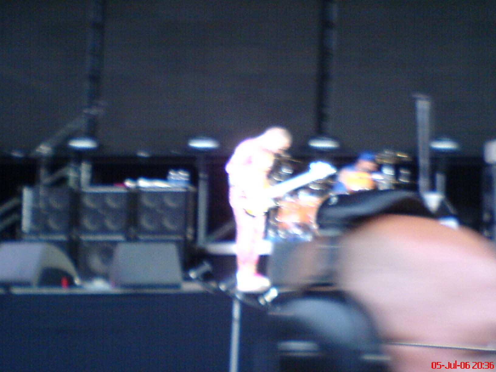 a blurry image of some band on stage