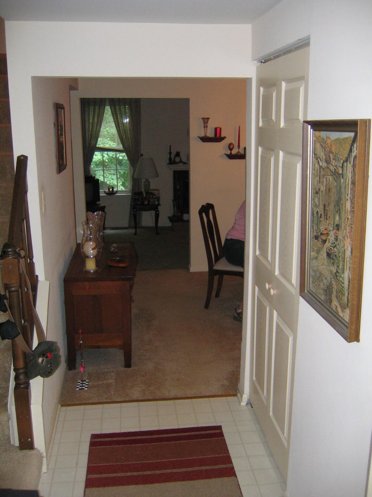 an archway between two living rooms has been decorated