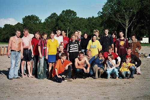 the group of young people is posing together