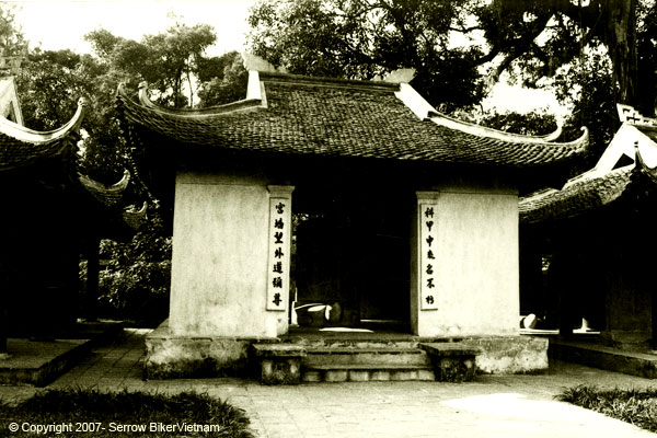 a small chinese style house with the door opened