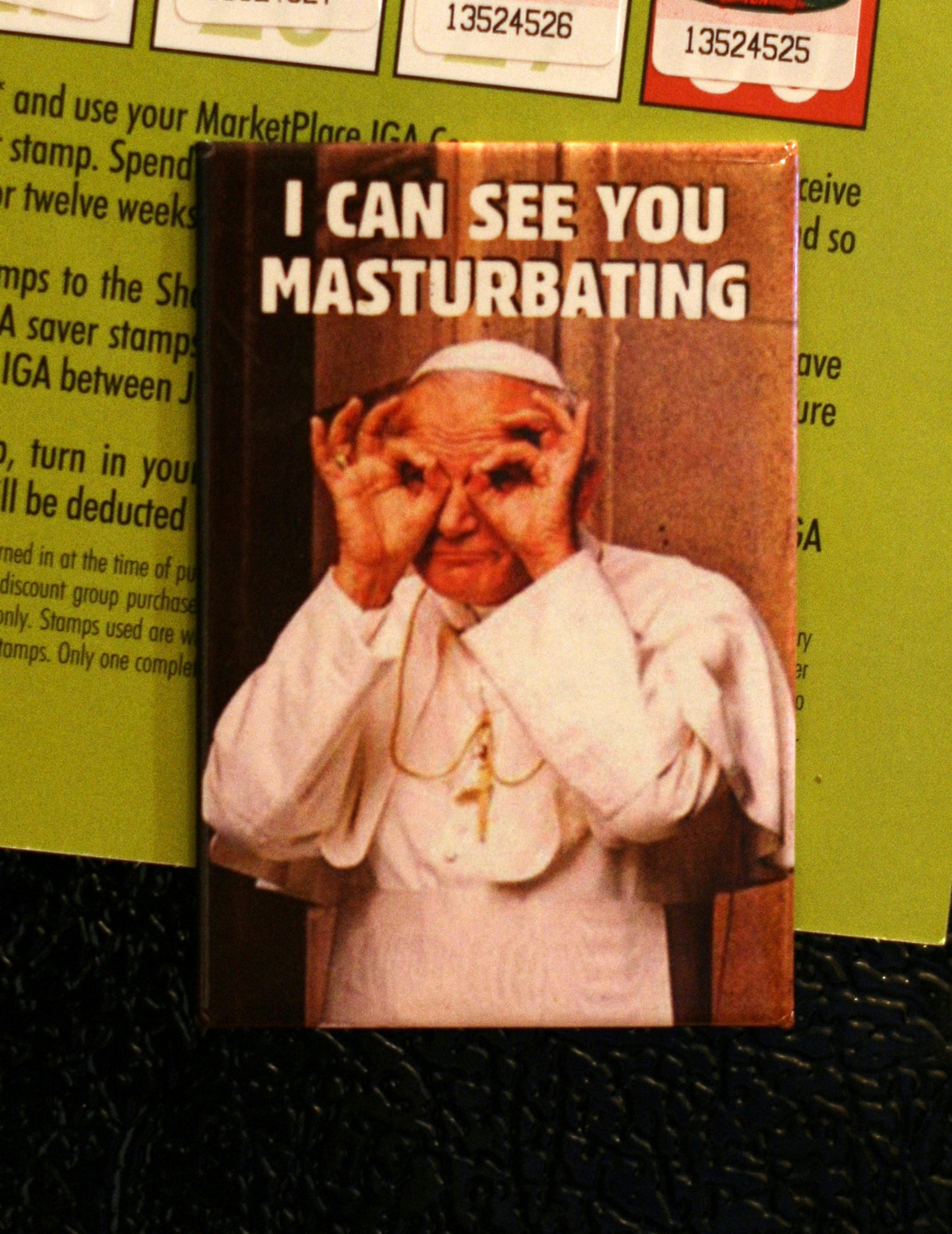 a card with pope george j bush holding his hands to his forehead