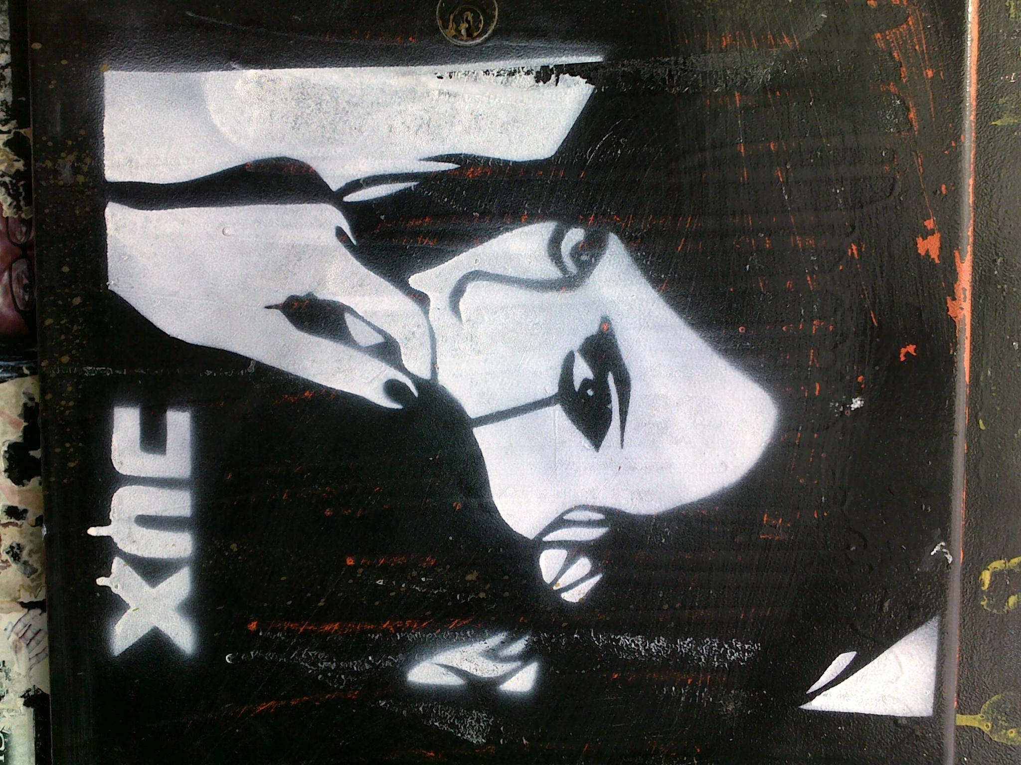 some black and white art that has graffiti on it