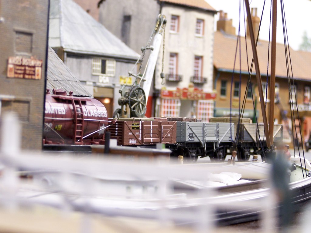 an action scene depicting a dock with many toy trains