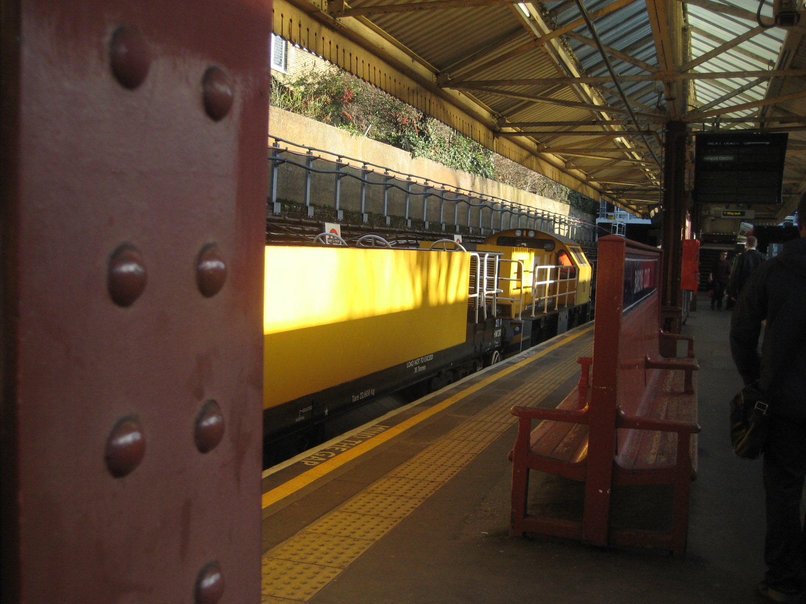 a passenger train pulling into a train station