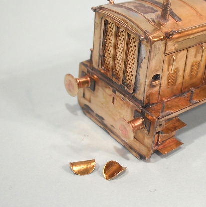 an old wooden toy truck with metal parts and pieces