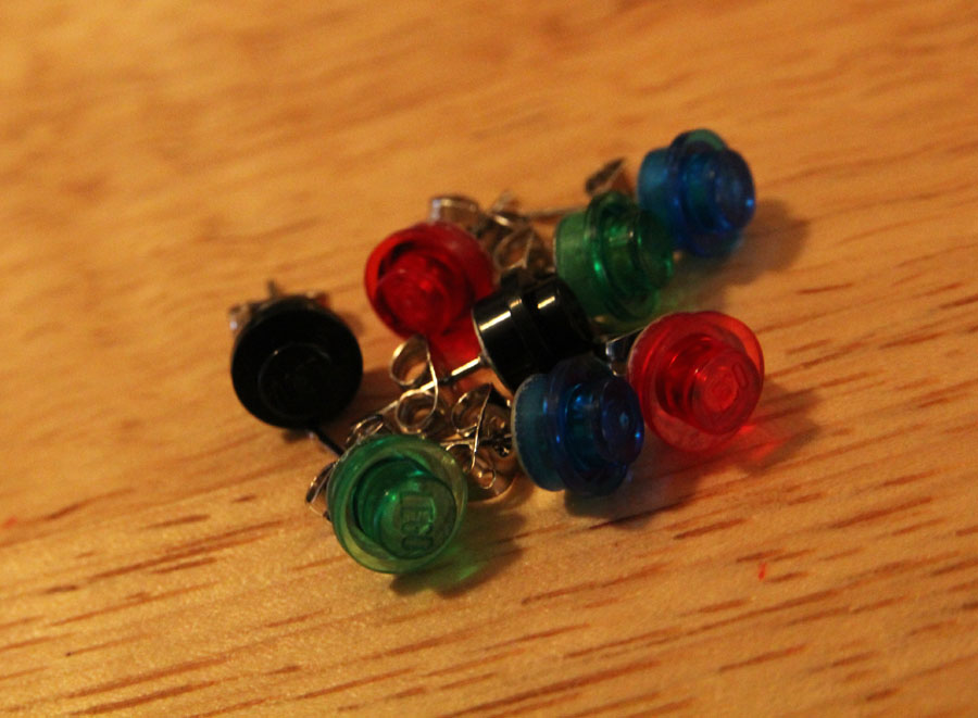 five pieces of jewelry sitting on a table