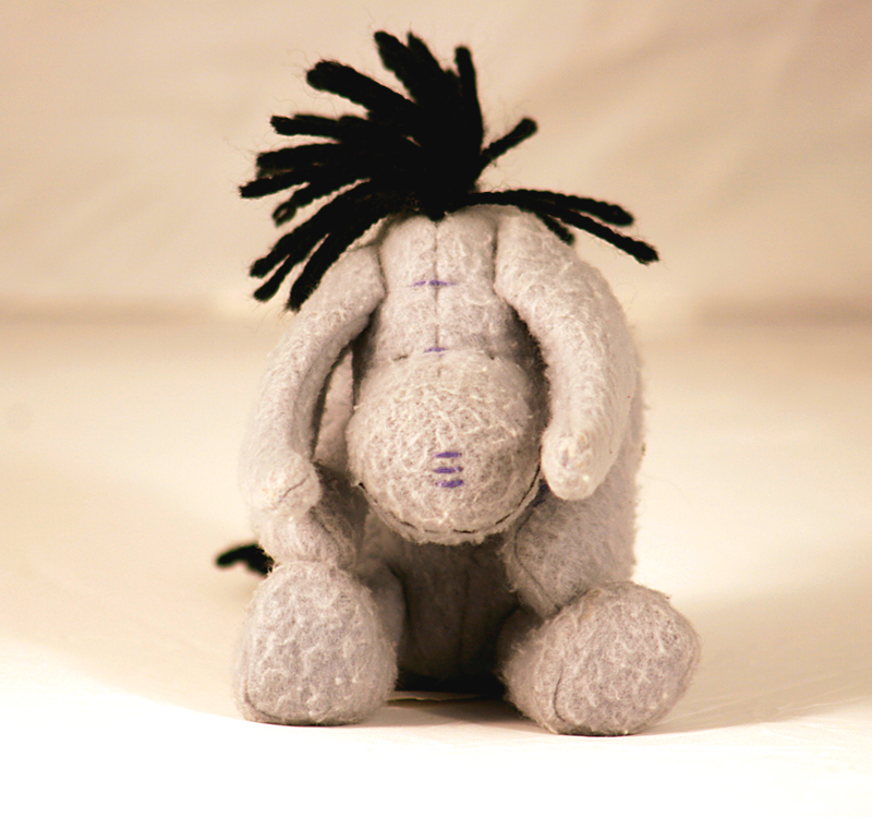 this is a stuffed animal with dreadlocks on