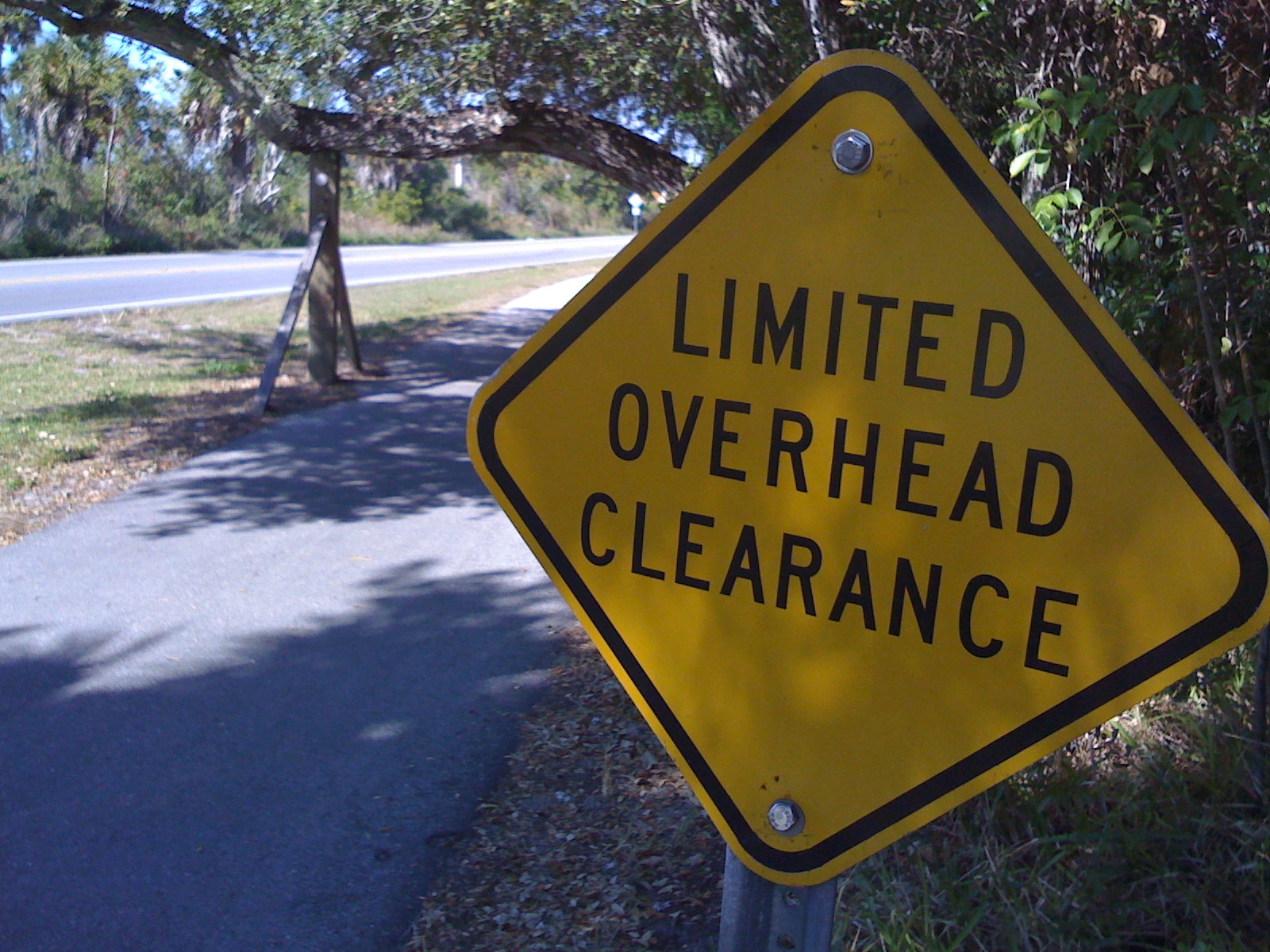 this sign shows an over head clearance on the side of the road