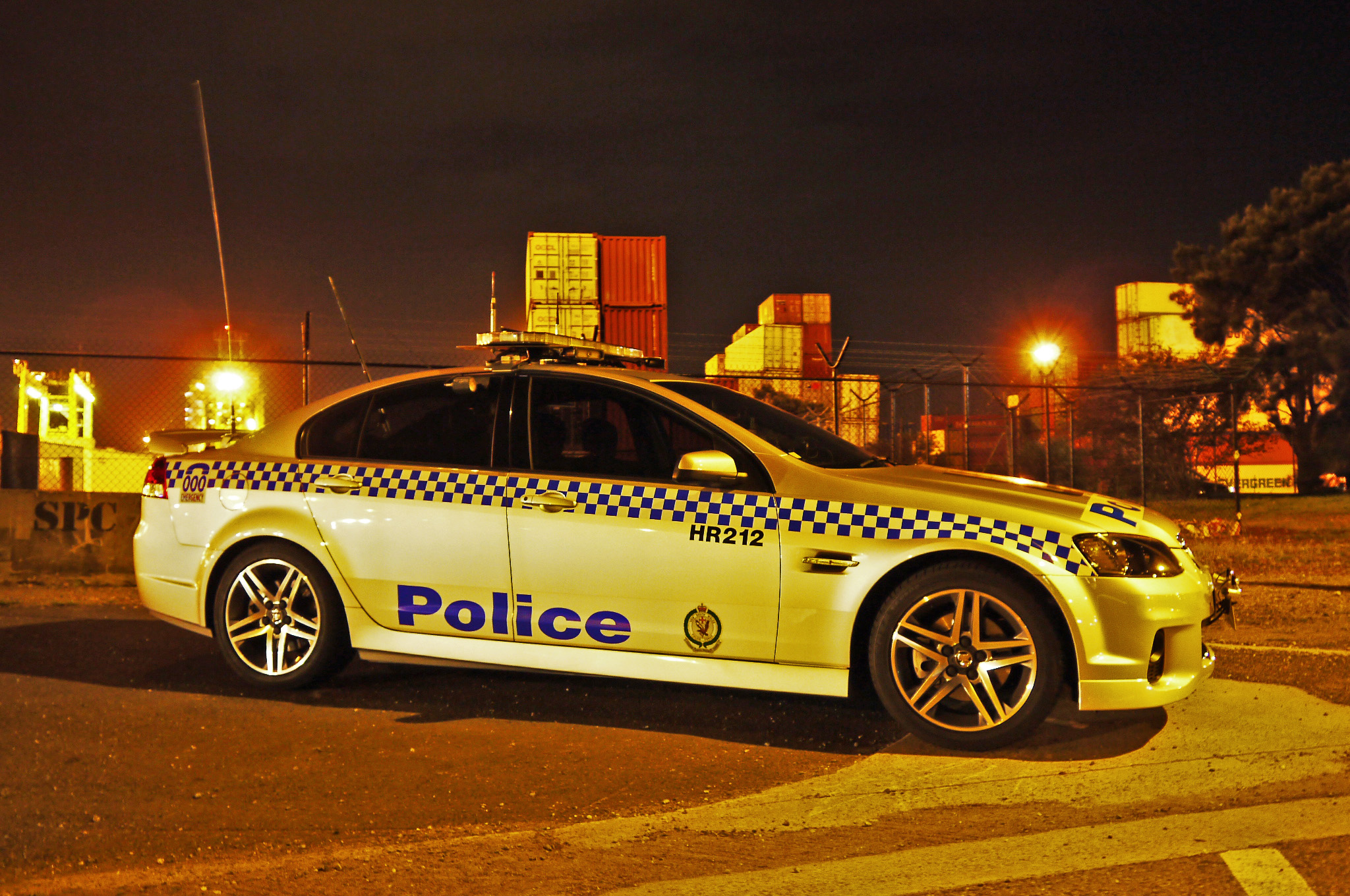 a police car parked on the side of a street