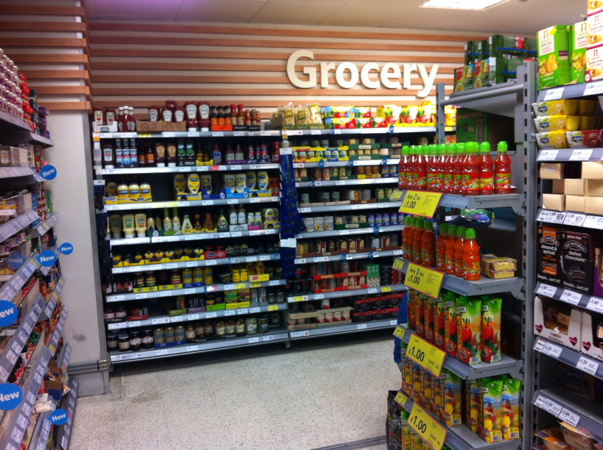 a grocery store filled with lots of condiments and drinks