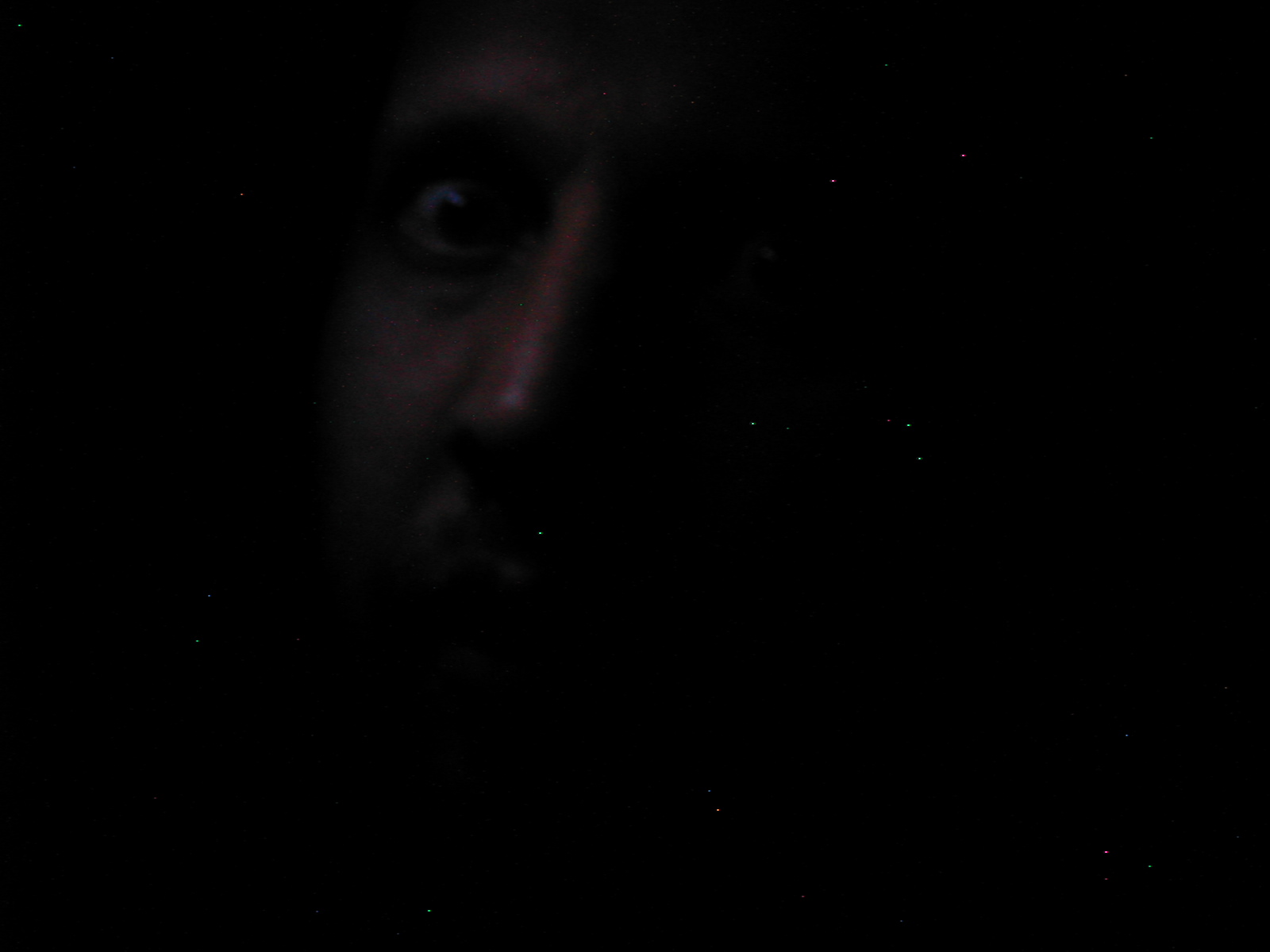 an eye view of a person in the dark