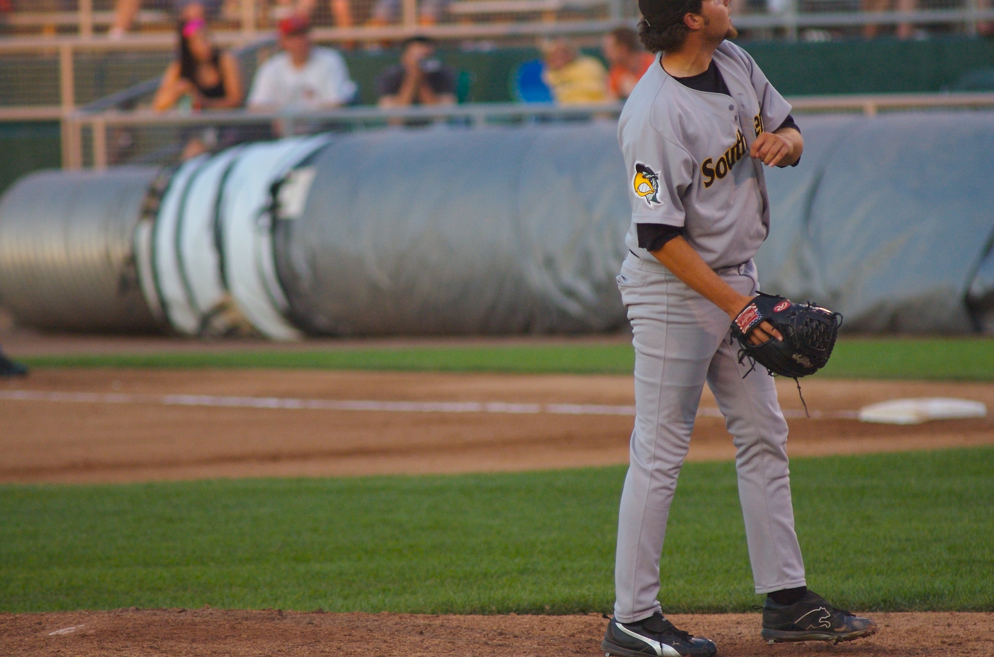 the baseball player is waiting to throw the ball