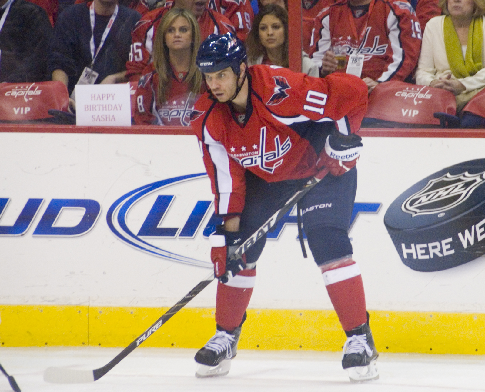 a hockey player stands on the ice during a game