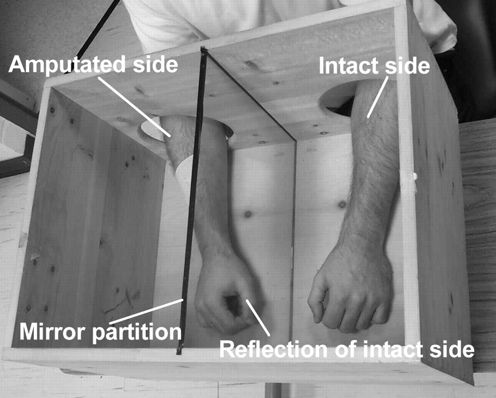 man removing furniture from an entertainment room with instructions