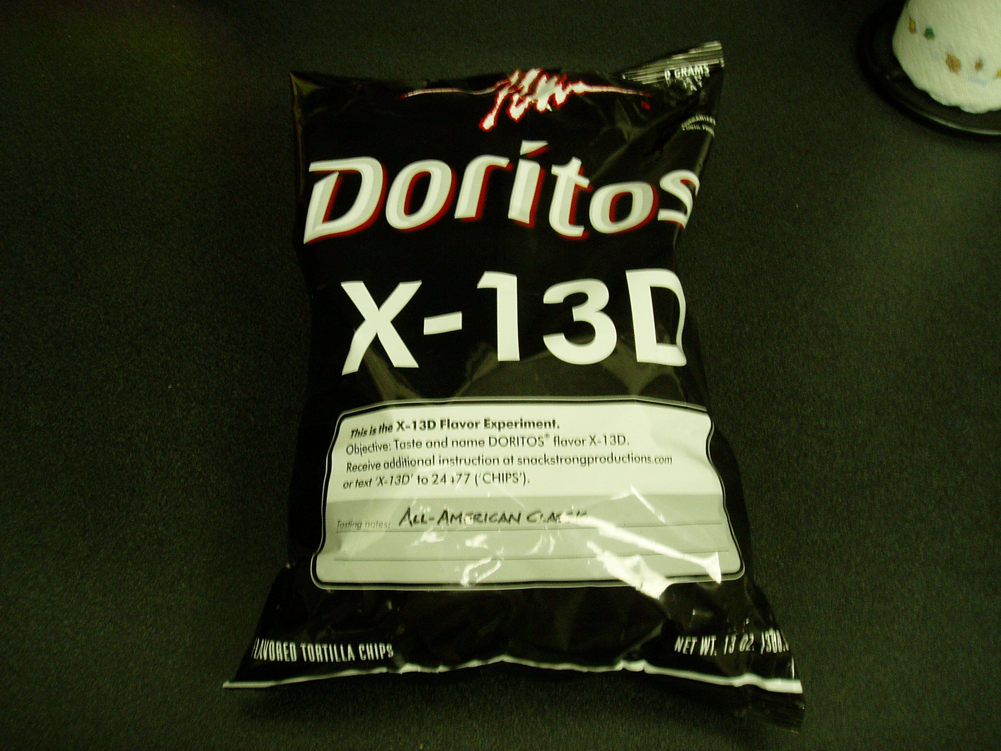 a bag of donritos sitting on a black table