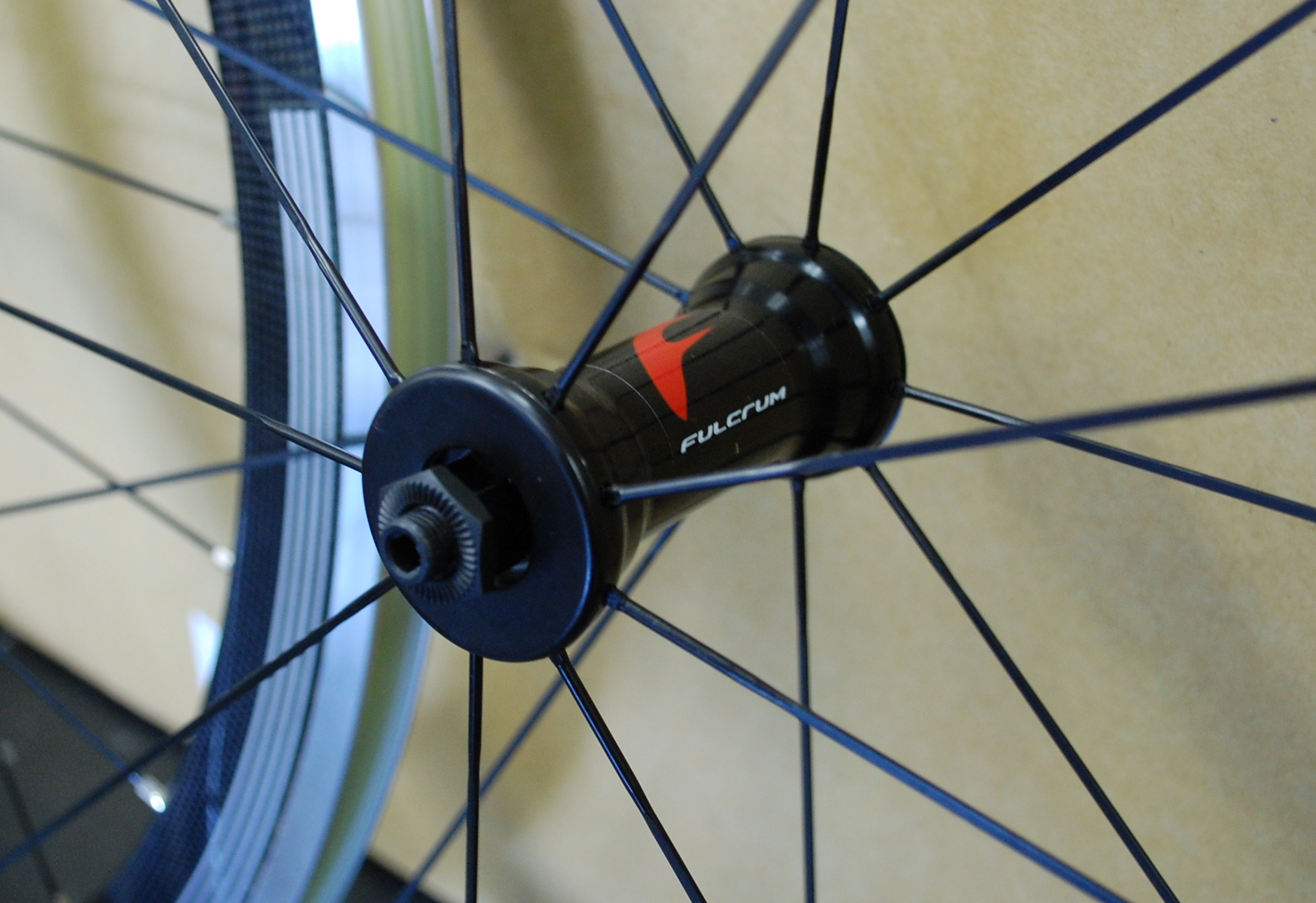 a close up of a bicycle wheel with the spokes
