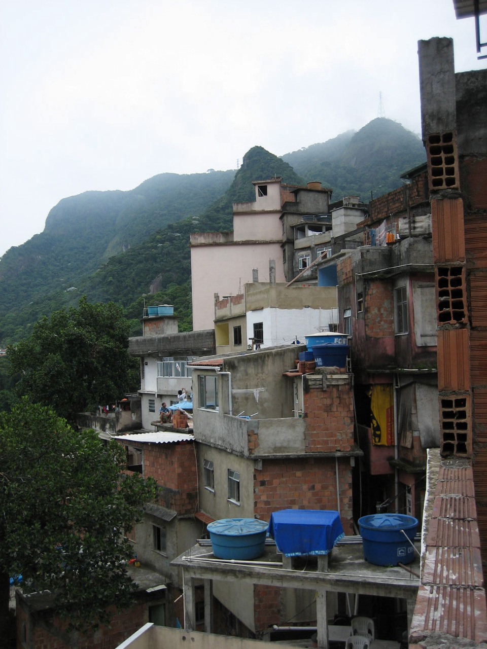 city buildings on the top floor, including a bunch of water tanks