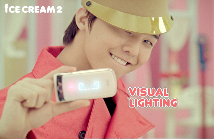 an asian guy dressed as a soldier, with the word visual lighting displayed on the screen