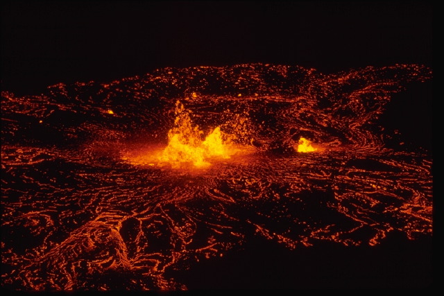 a big field with lava surrounding it