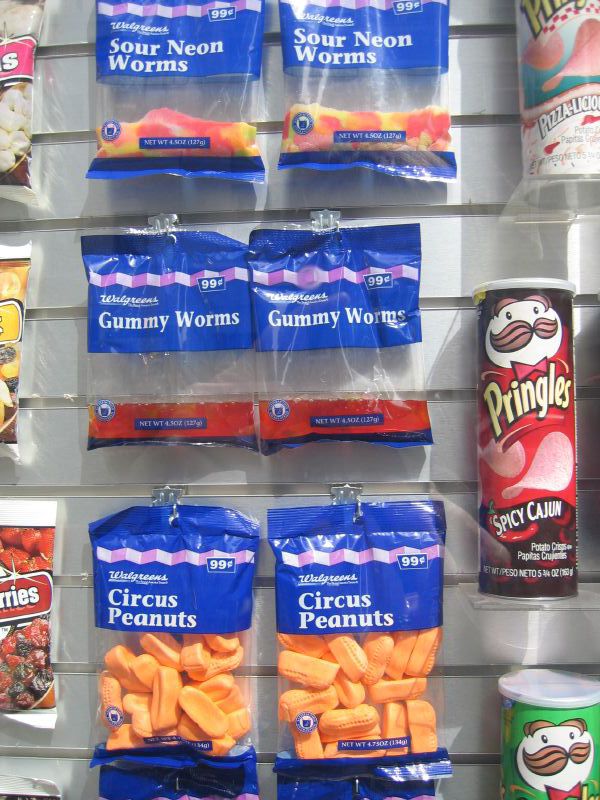 several display cases holding packaged snacks for sale