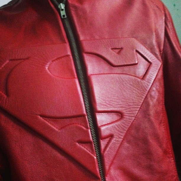 a red leather superman jacket with the number 5