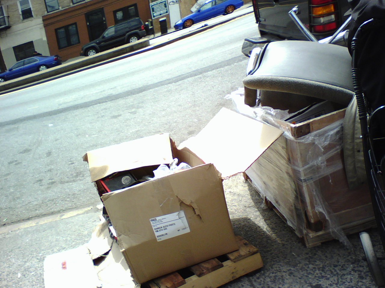 boxes and other stuff on the side of the road