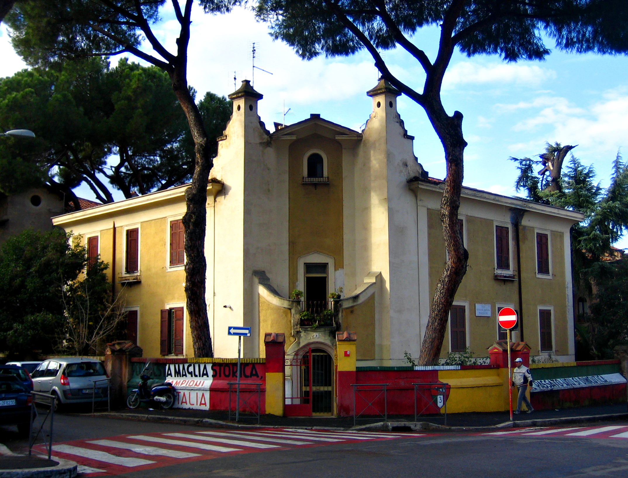 the church is painted bright yellow and red