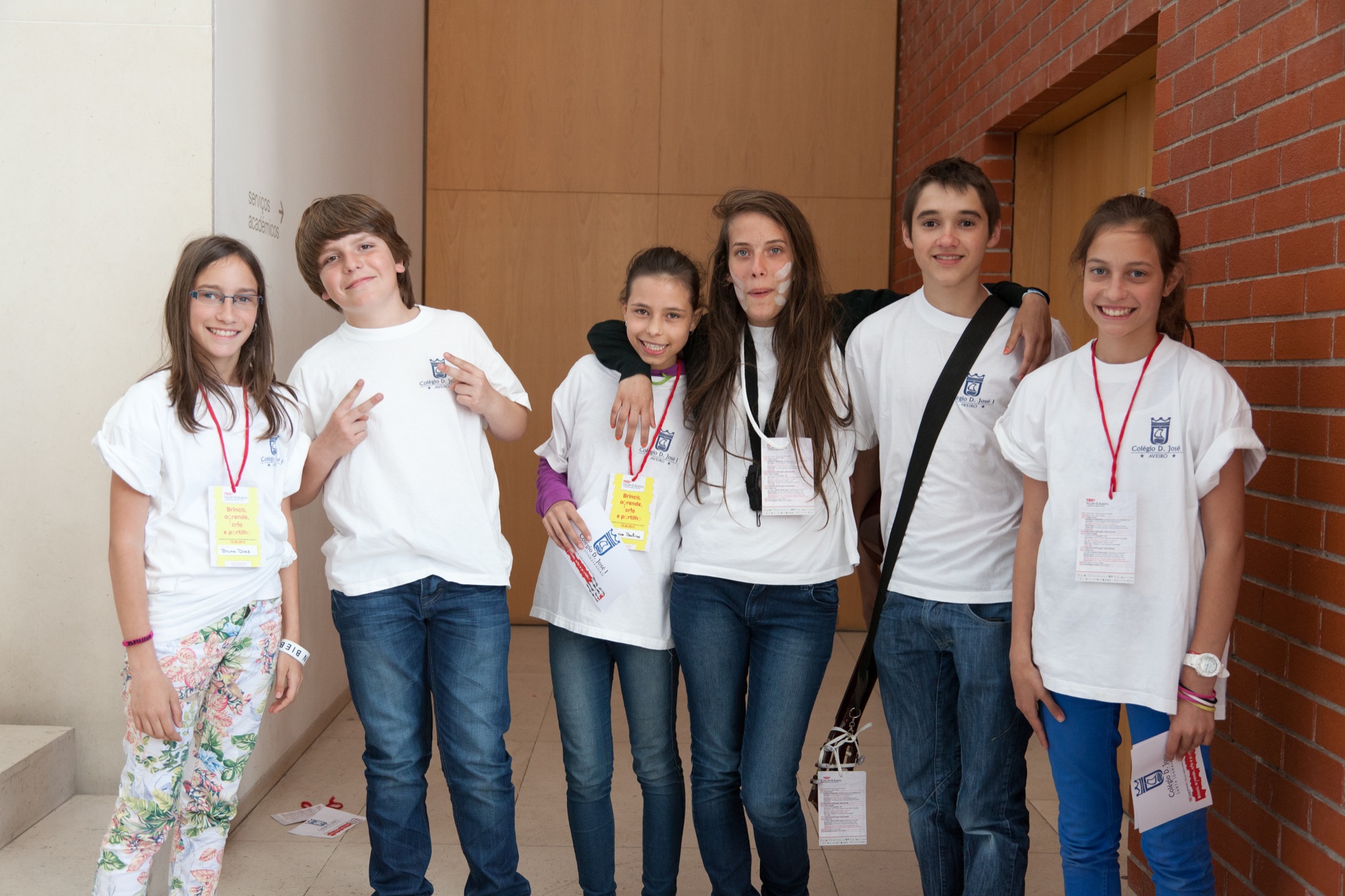 group of five girls posing for a po