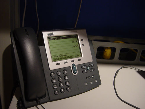 a close up of an answering device on a table