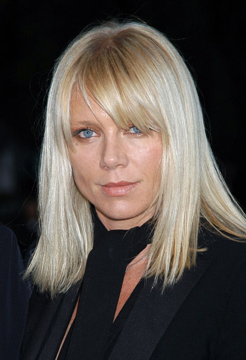 an image of a blond woman with blue eyes