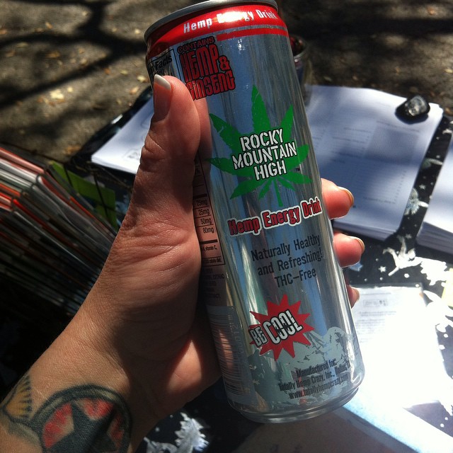 a can of mountain high drink being held in the hand