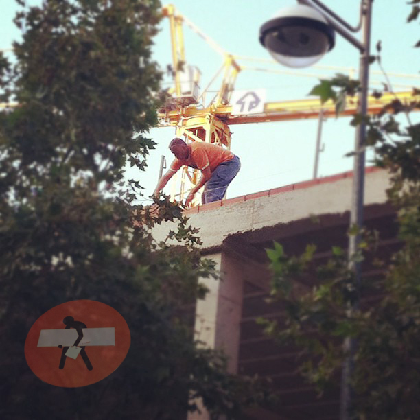 a person works on a construction site with street light