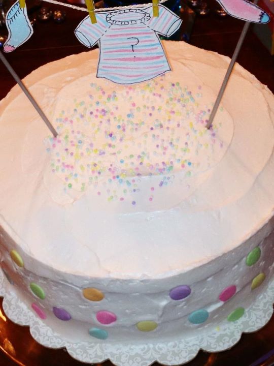 a cake decorated with two flags for 1st birthday