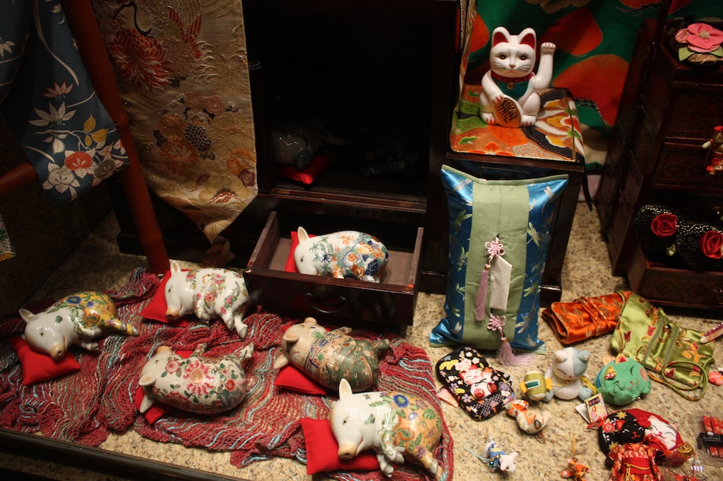 several colorful objects are on display with decorative pieces